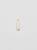 Product shot of the Safety Pin Earring (14Kt Shiny Rose Gold Safety Pin Earring Length: 21.35mm) Background: Grey backdrop