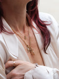 14Kt Yellow Gold Padlock Charm Necklace pictured on model.