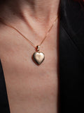 14kt Yellow Gold Heart Locket pictured on model.