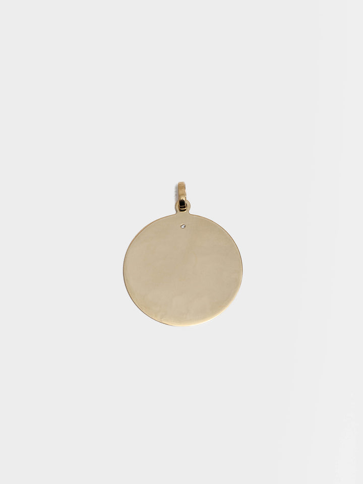 14kt Yellow Gold XL Disk Pendant with Diamond Pendant pictured on light grey background. 