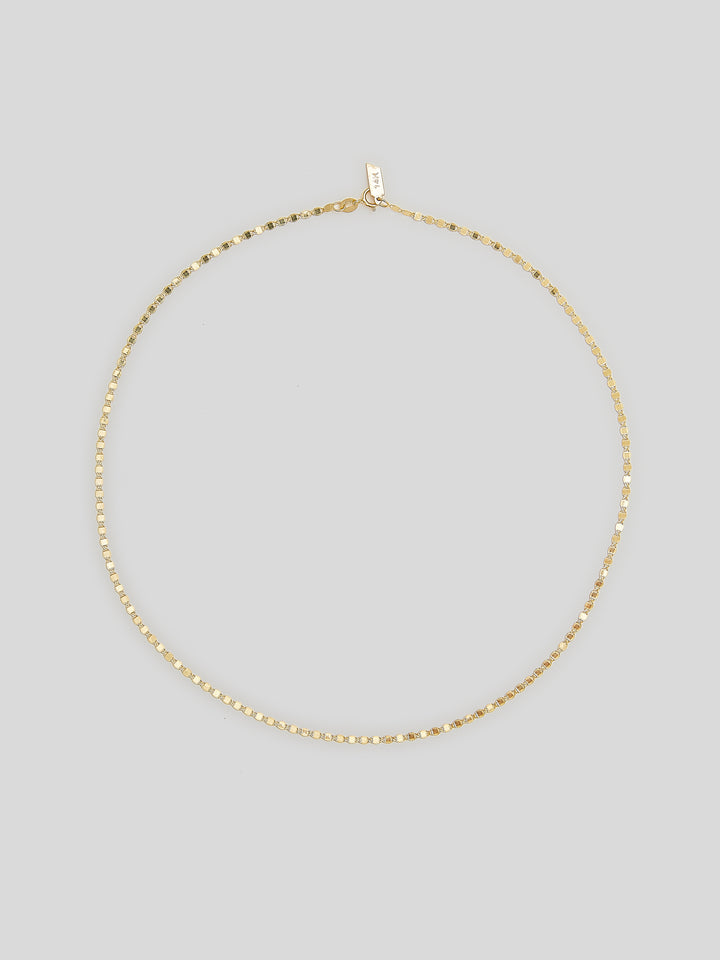 Product image of yellow gold valentino chain necklace on white background. 