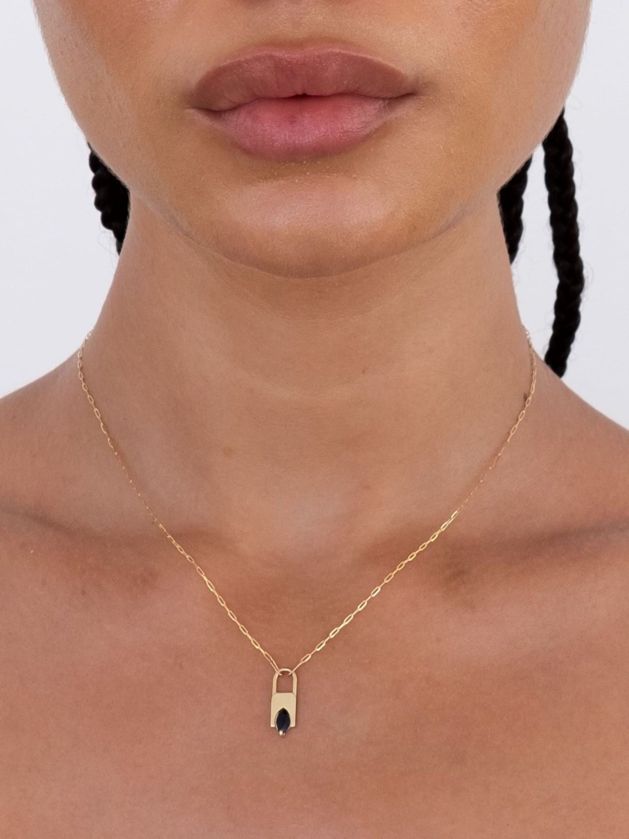 14kt Yellow Gold Luchetto Gem Charm Necklace pictured on model. 