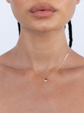 10k Yellow Gold Baby Valentino 8mm Heart ID Chain Necklace pictured on model.