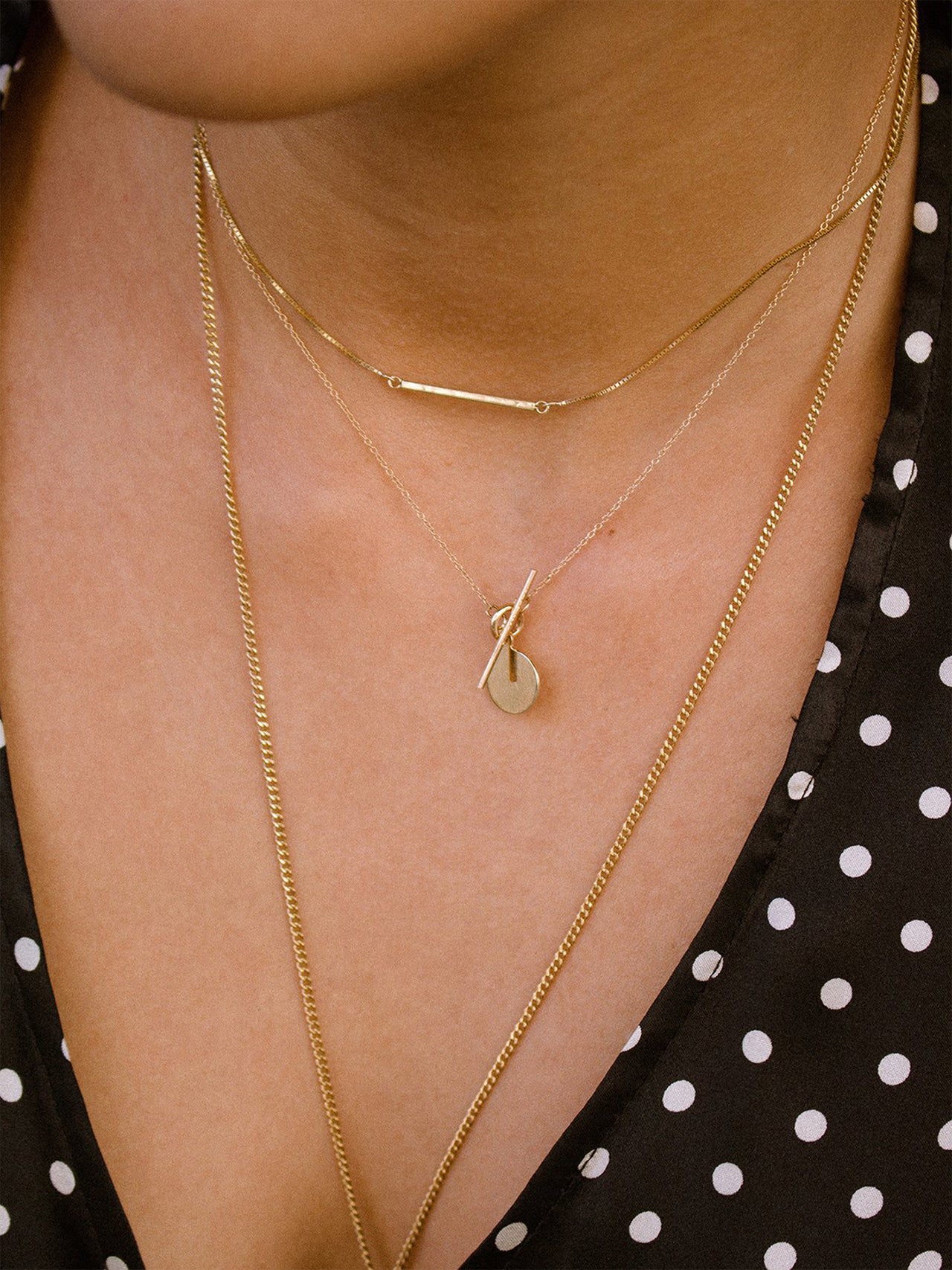 14Kt Yellow Gold Disk and Toggle Necklace shot on model