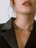 Seed Pearl Safety Pin Choker shot on model - styled with safety pin closure in the front. 