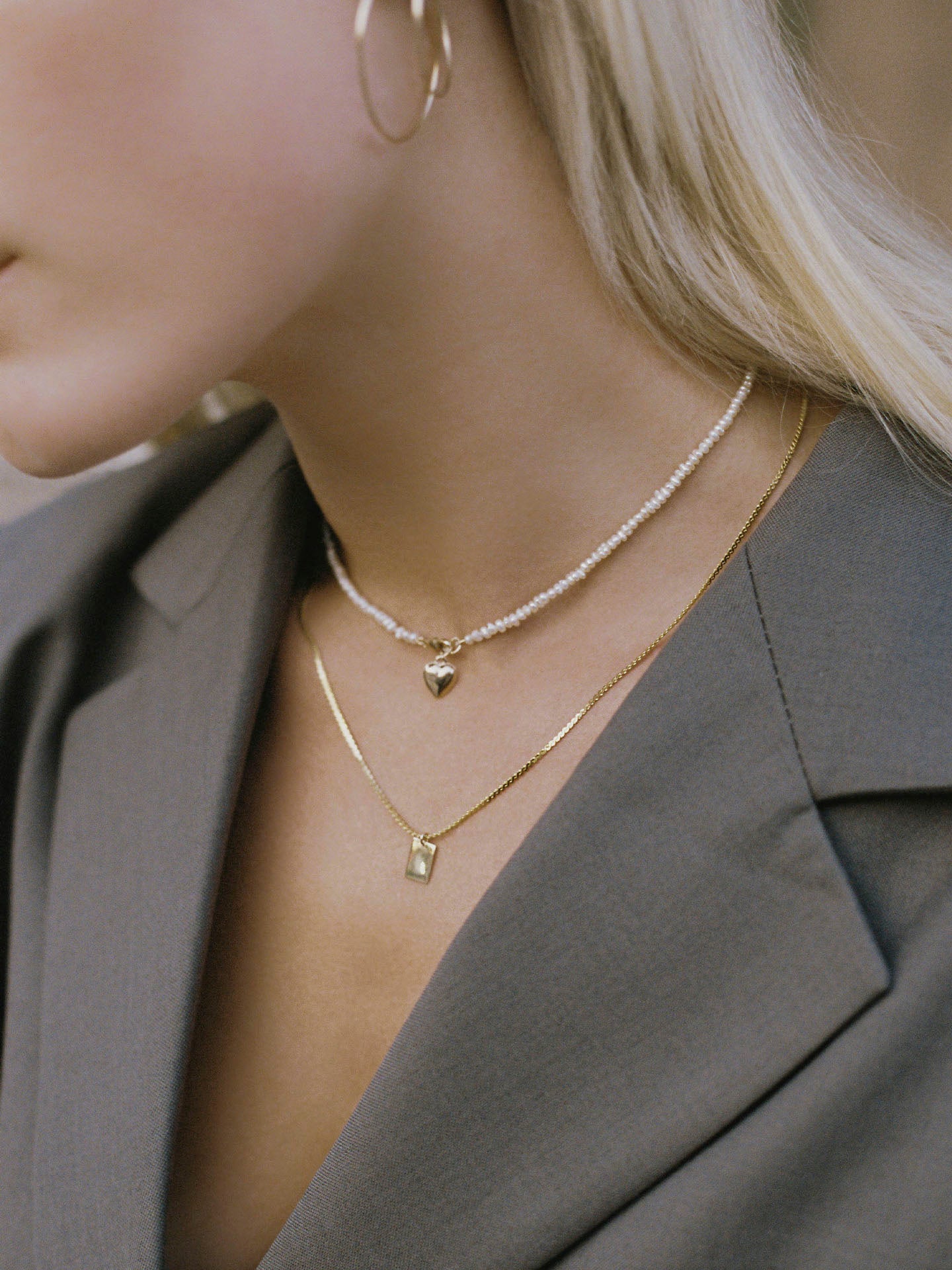 Puff Love Choker show on model with other necklace