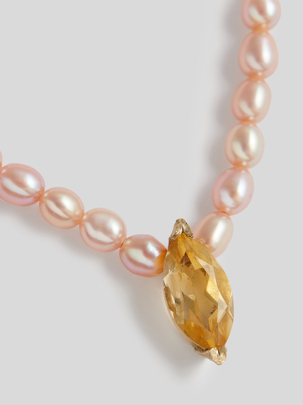 14kt Yellow Gold Pink Pearl Necklace close up of Citrine faceted stone setting. 
