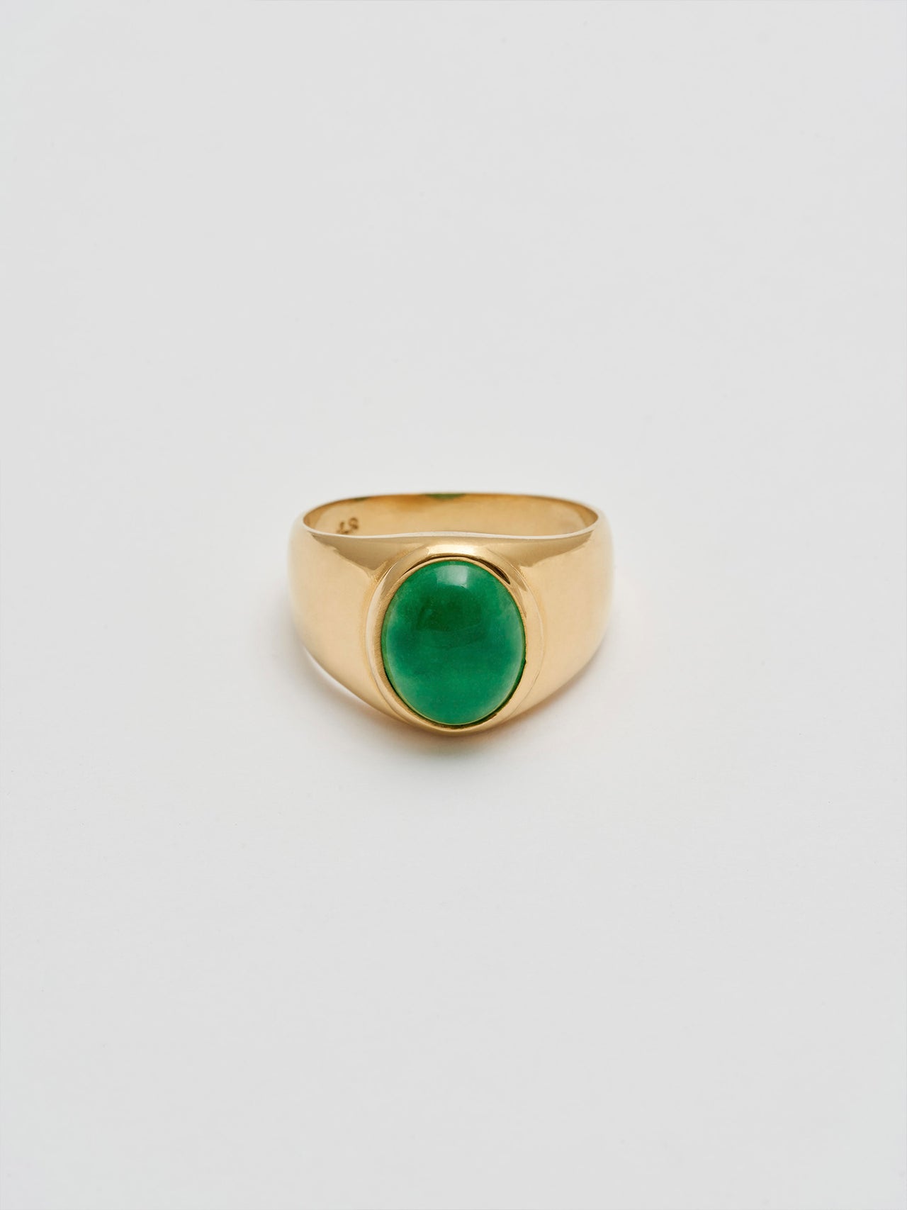Product shot of the front of Classico Jade signet ring (Shiny vermeil tapered signet ring band with Oval Green Jade stone in center) with white Background.