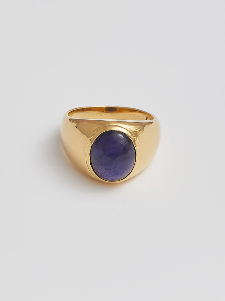 Front product shot of the Classico Iolite Signet (Vermeil Iolite Signet Ring Face: 12.9×2.8mm 8×11 Cabochon Iolite) Background: Grey backdrop