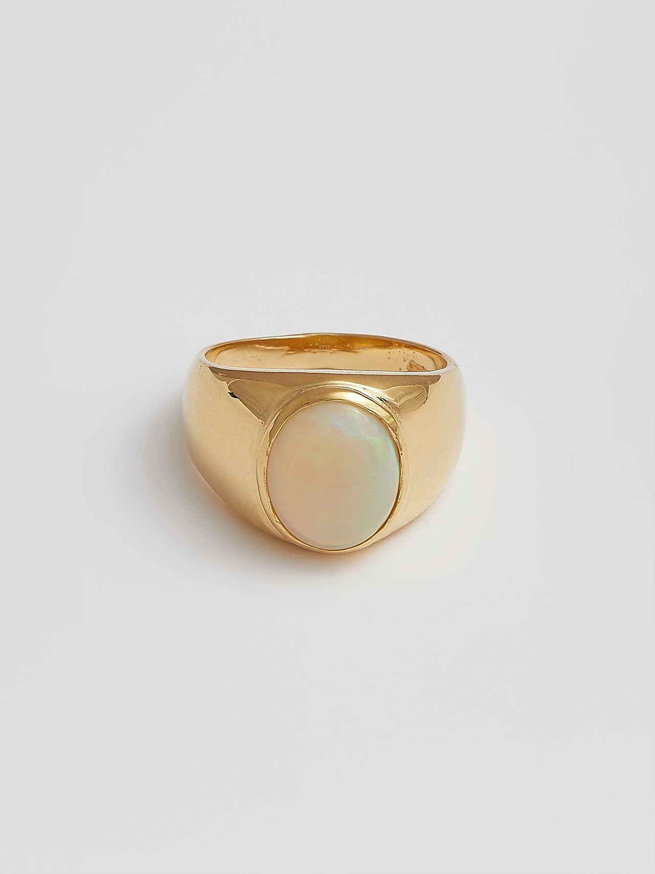 Product shot of the Classico Opal Signet (Vermeil Opal Signet Ring Face: 12.9mm×2.8mm 8x11mm Cabochon Opal, Approx 2.5ct) Background: Grey backdrop
