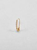 14Kt Yellow Gold Diamond Safety Pin Earring  pictured on light grey background.