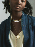 Sterling Silver XL Infinity Hoops pictured on model. 