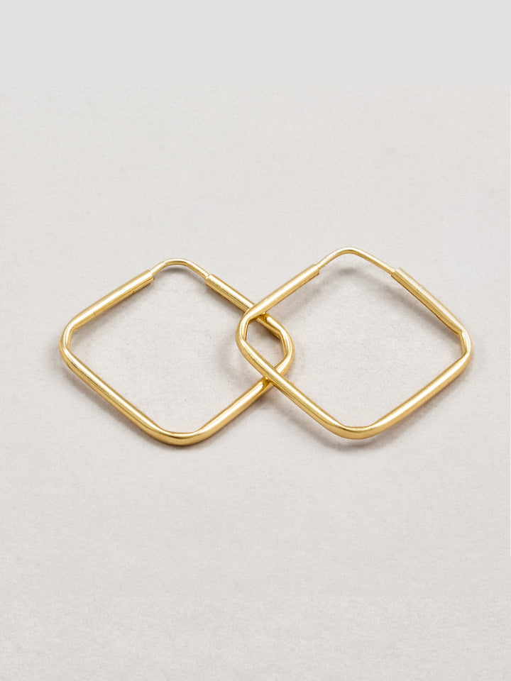 10kt Yellow Gold Square Infinity Hoops pictured on light grey background.