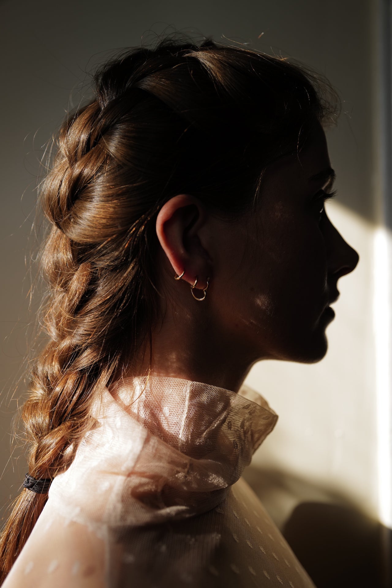 Heart Feels Hoops shot on models ear from side profile. 