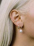 14kt Yellow Gold Highlight Ear Cuff pictured on models ear. 