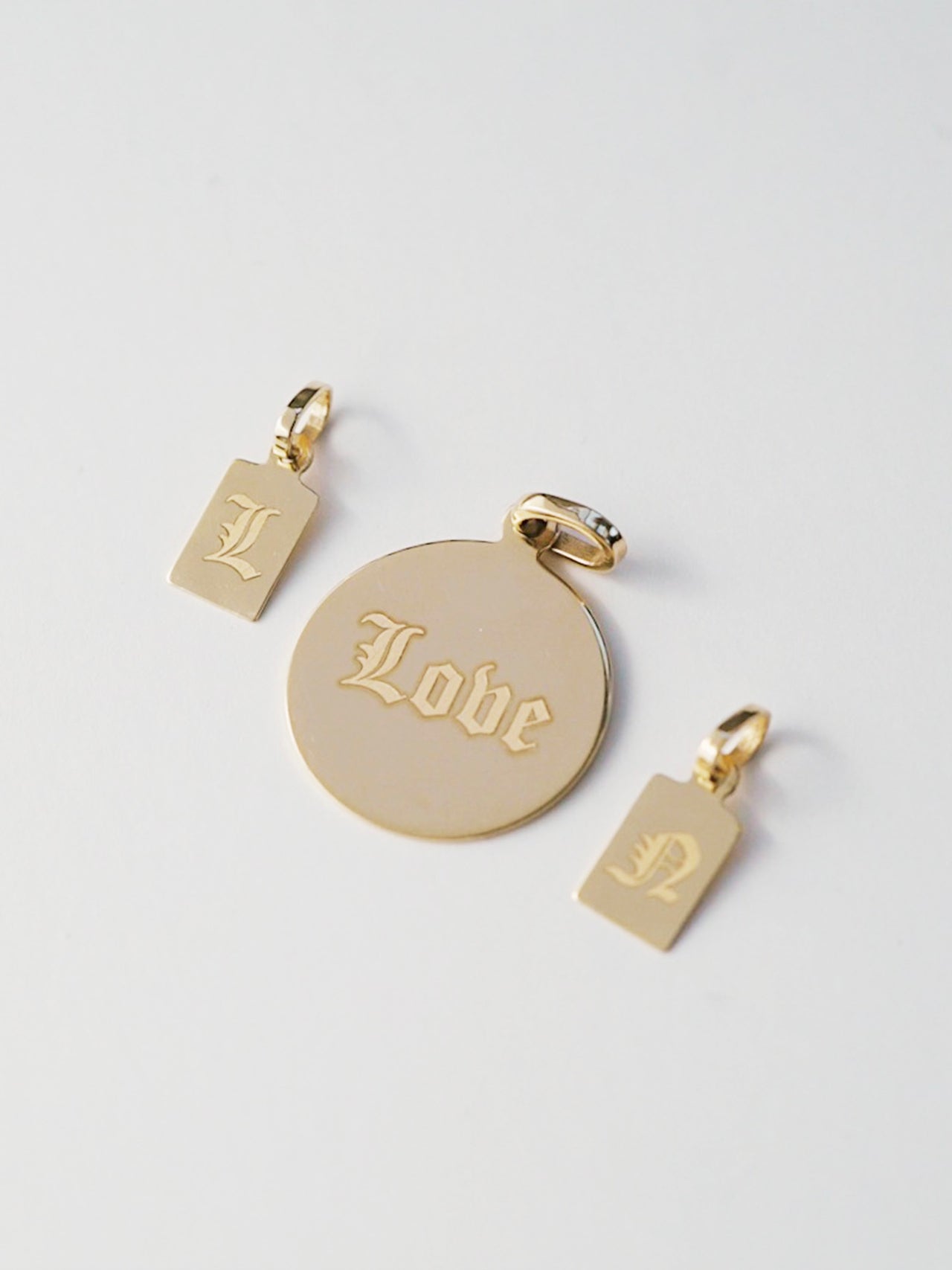Klint Id Charm Pendants with engravings: "L" & "A"