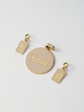 Engraved round disk pendant with 'Love' in Gothic Font. Two rectangle Klint ID Pendants are also featured in picture.