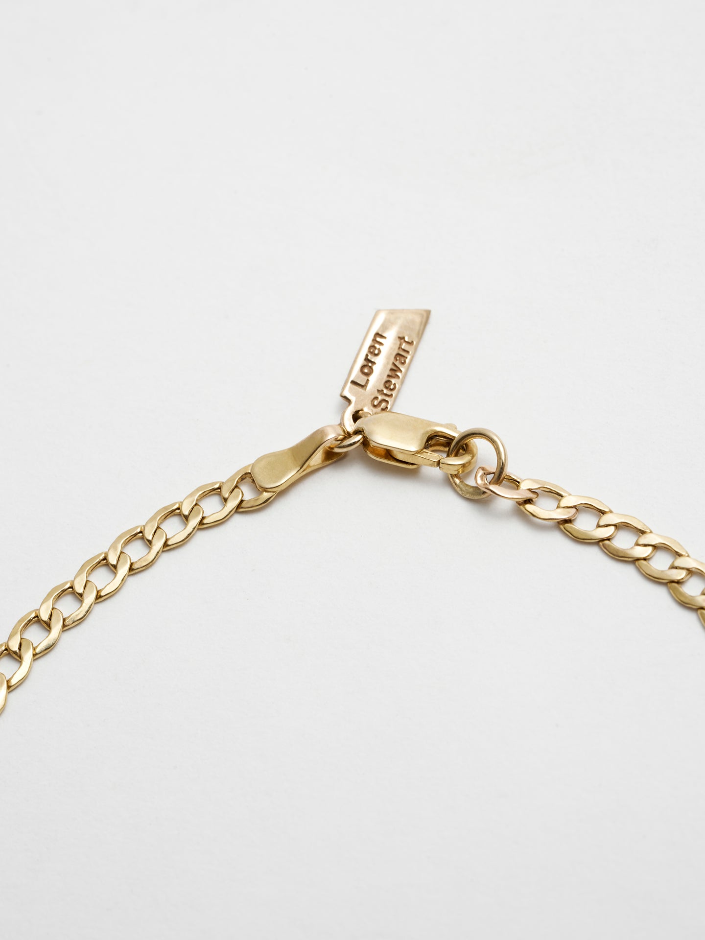 XL Lightweight Havana Chain Bracelet: 14Kt Yellow Gold-Plated Sterling Silver Hollow Chain Bracelet Length: 7” Width: 3.3mm