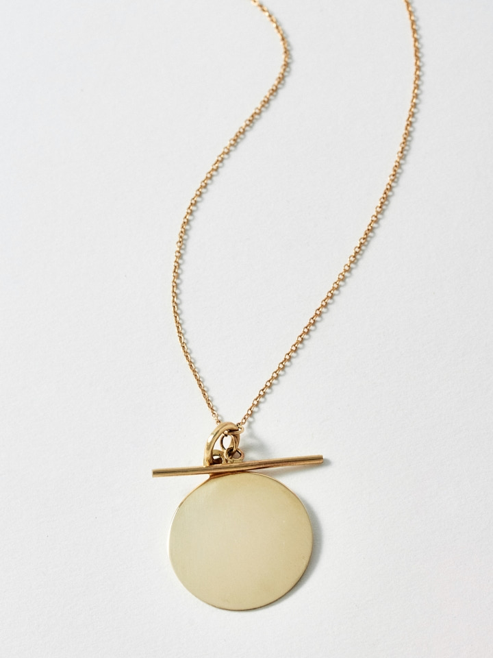 Close up of 14Kt Yellow Gold Disk and Toggle Necklace