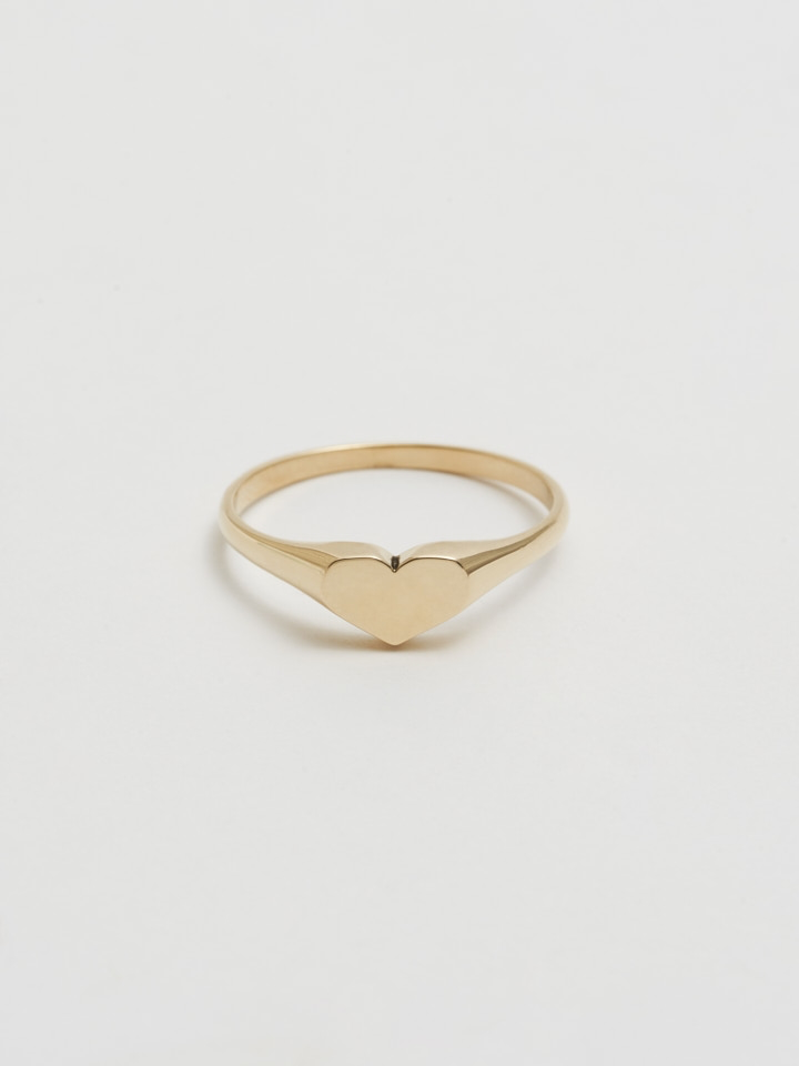 Product shot of Mini Heart Signer: 14Kt Shiny Yellow Gold Ring with 5mm Mini Heart Face with white background