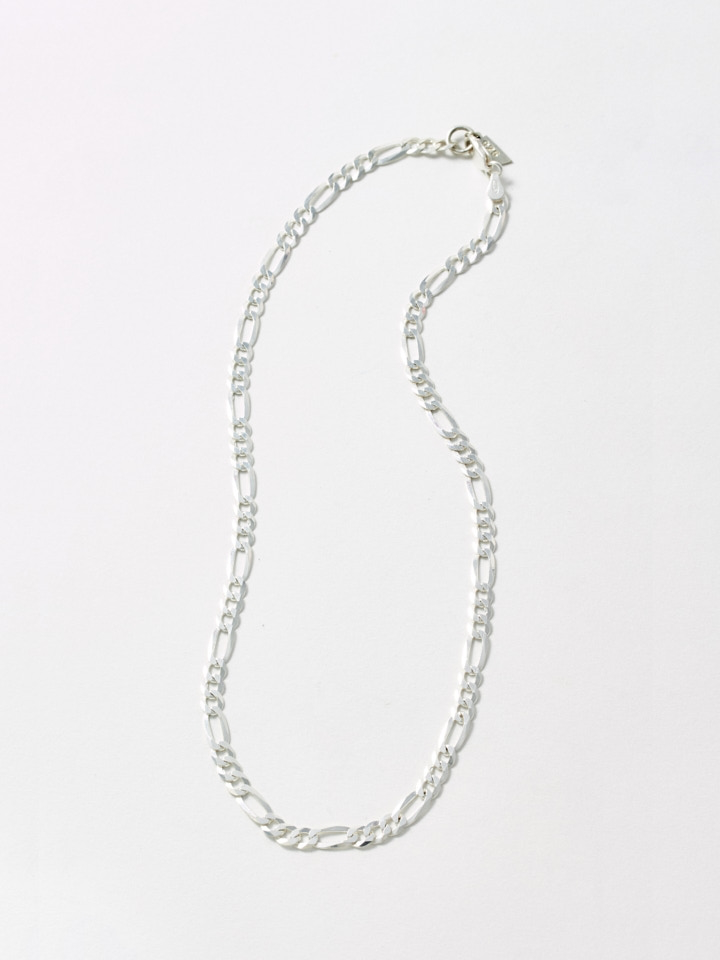Sterling Silver XL Figaro Chain pictured on light grey background. 