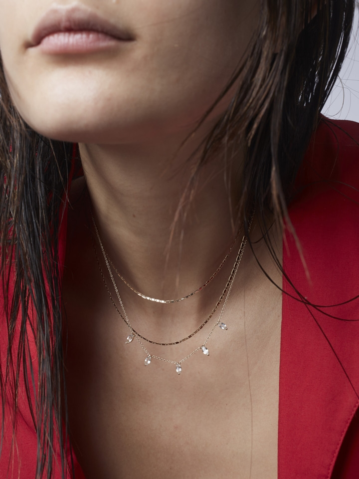 10Kt Italian Tri-Colored Yellow, Rose, and White Gold Chain pictured on model.