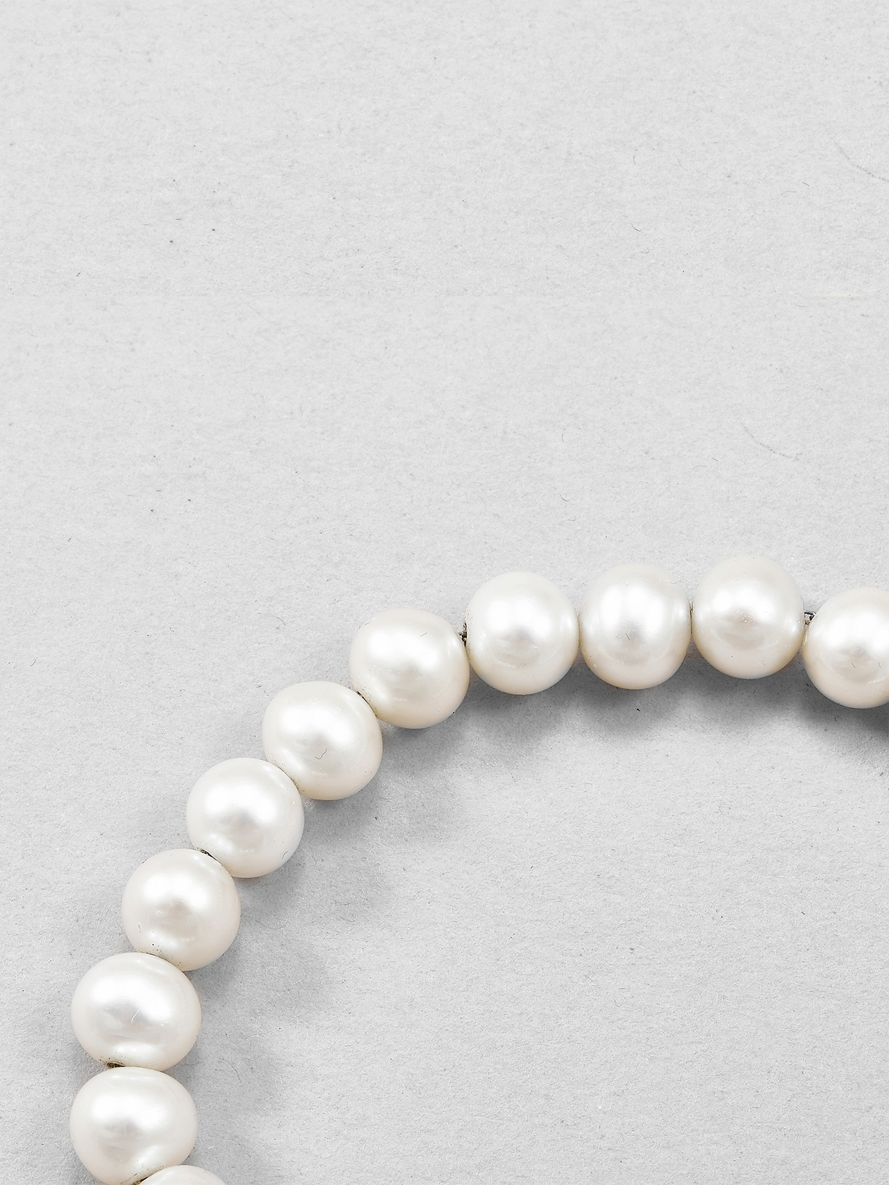 product imagery of pearl safety pin bracelet