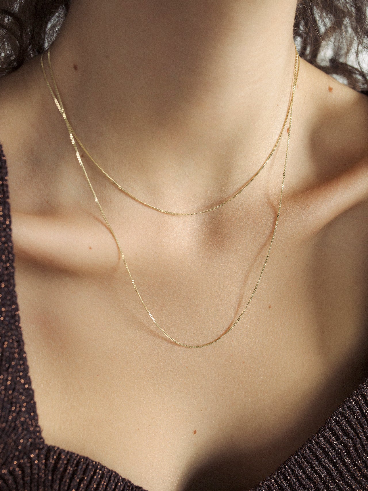 14Kt Yellow Gold Thin Curb Chain shot on model